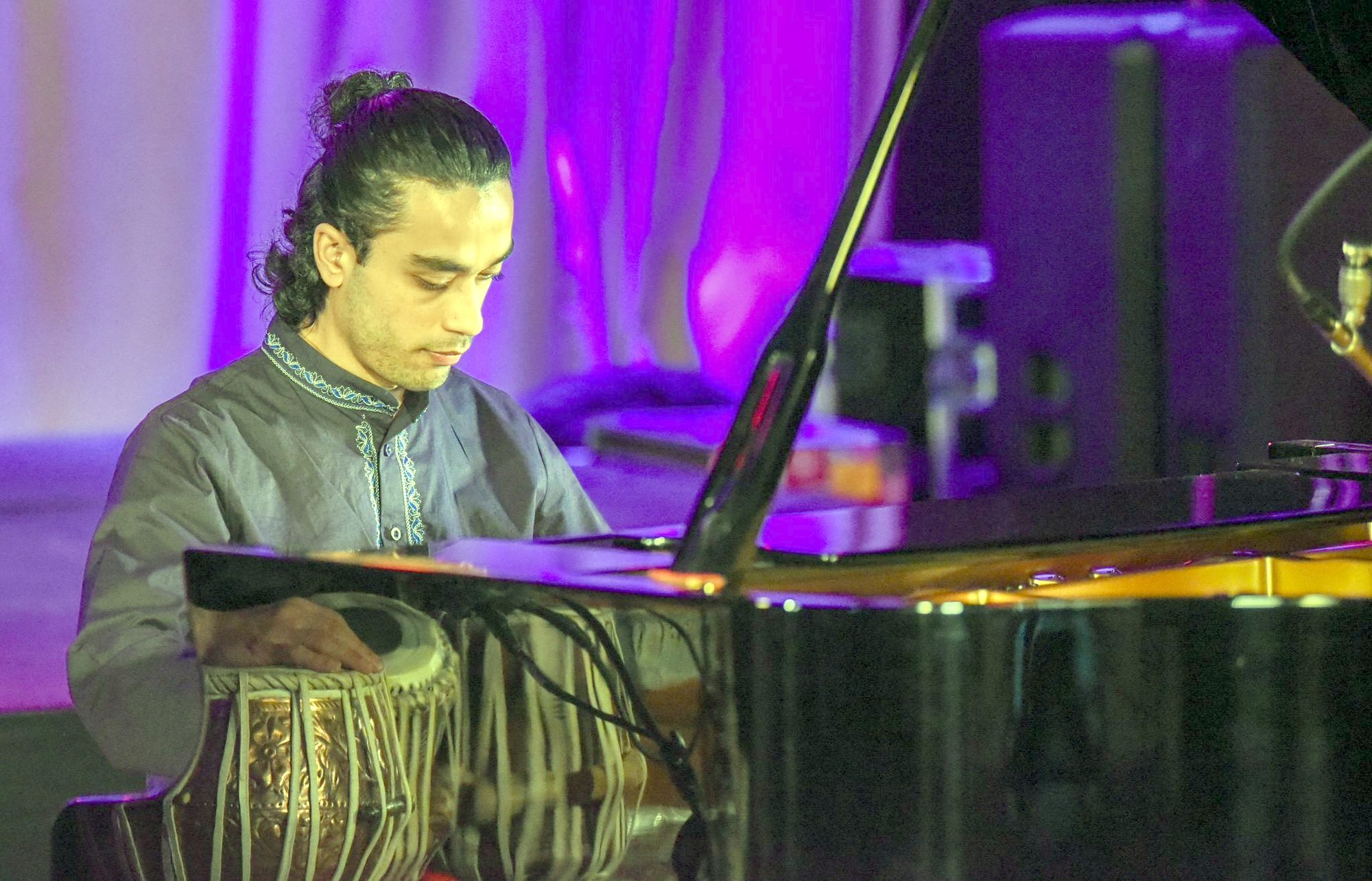 Elham Fanoos at the piano during an ensemble performance